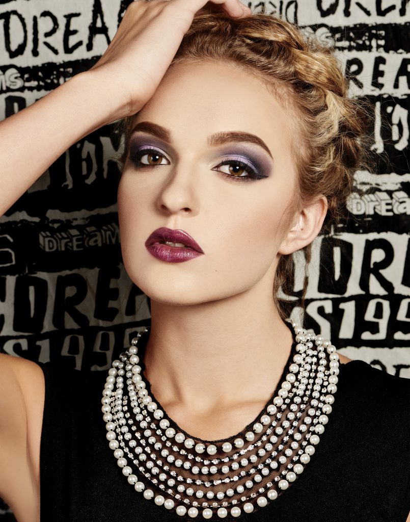 high fashion woman with high fashion makeup