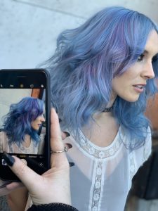 Model with blue Pulp Riot hair color.