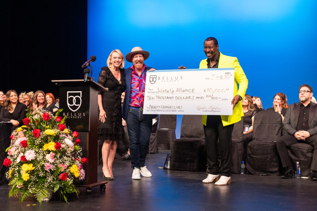 Staff giving studuent scholarship award.